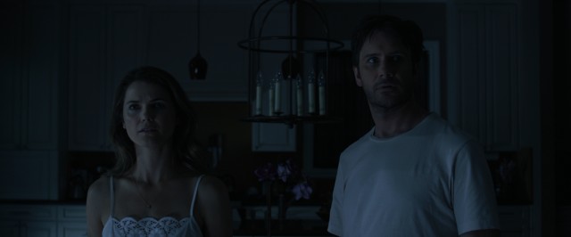 In "Dark Skies", Lacy (Keri Russell) and Daniel Barrett (Josh Hamilton) have their sleep disturbed on a number of early summer nights.