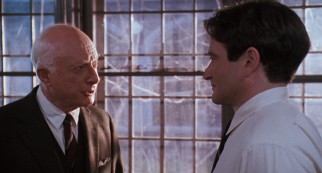 Welton headmaster Mr. Nolan (Norman Lloyd) gives Keating (Robin Williams) grief over what he has been teaching.