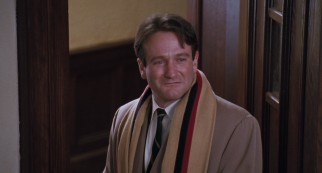 John Keating (Robin Williams) makes a heroic exit before his grateful pupils.