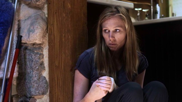 In "Dead Within", trying to endure a zombie apocalypse takes a toll on Kim (Amy Cale Peterson).