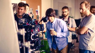 A behind-the-scenes still from "This is a Movie: Making (Dean)" shows Demetri Martin acting directorial.