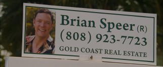 Matthew Lillard makes his first appearance as realtor and "other man" Brian Speer on a bench advertisement.
