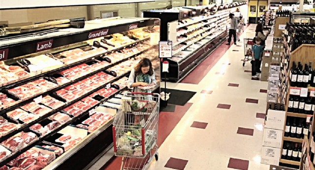 Grocery store surveillance footage captures Samantha McCall's sudden craving for raw meat in "Devil's Due."