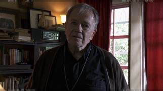 Sam Anderson appears as Father Thomas in this deleted scene.