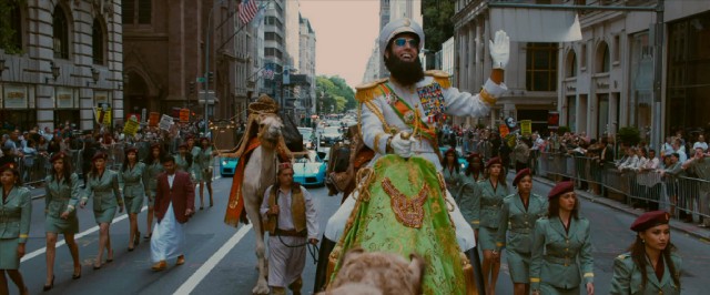 Wadiyan dictator Admiral General Aladeen (Sacha Baron Cohen) proudly rides down a Manhattan street on the back of a camel.