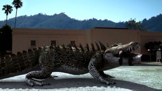 You'll have to know your reptiles to know whether this is Dinocroc or Supergator munching on a scientist as part of his laboratory escape.