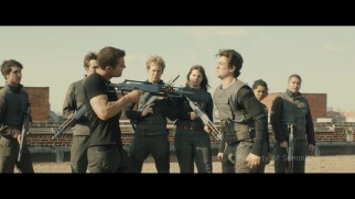 Four (Theo James) stands up to Peter (Miles Teller) in this deleted target practice scene.