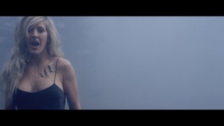 Ellie Goulding sports Tris' bird tattoo in her foggy "Beating Heart" music video.