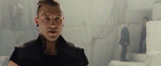 Pierced instructor Eric (Jai Courtney) pushes Dauntless initiates to their limits.