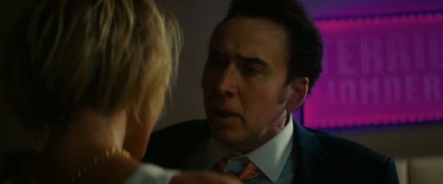 Troy (Nicolas Cage) tells a prostitute about Nice, France in "Dog Eat Dog."