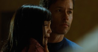 The arms of her loving father (Guy Pearce) are not enough to put Sally (Bailee Madison) at ease.