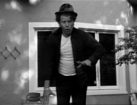Tom Waits' deck dancing, unintended for public consumption, becomes the heart of his Jarmusch-directed music video for his Cole Porter charity cover "It's All Right With Me."
