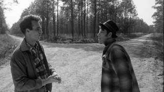 Having swapped coats, Jack (John Lurie) and Zack (Tom Waits) prepare to part ways down divergent paths at the end of the film.