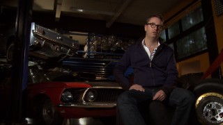 Director Nicholas Winding Refn gives an interview from a garage in "Drive Without a Driver."