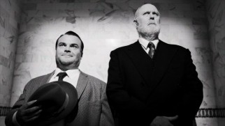 Orson Welles (Jack Black) and the inspiration for Citizen Kane, William Randolph Hearst (John Lithgow), share an awkward elevator ride together in the Hollywood episode of "Drunk History."
