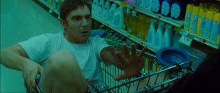 Undead assistant Marcus (Sam Huntington), a Groucho Marx double in the comic books, looks at his new replacement arm.