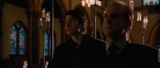 Dylan Dog (Brandon Routh) has a talk with distraught werewolf patriarch Gabriel (Peter Stormare).
