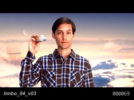 Jeff (Tobey Maguire) proudly displays an important can of tuna in the ethereal alternate beginning.