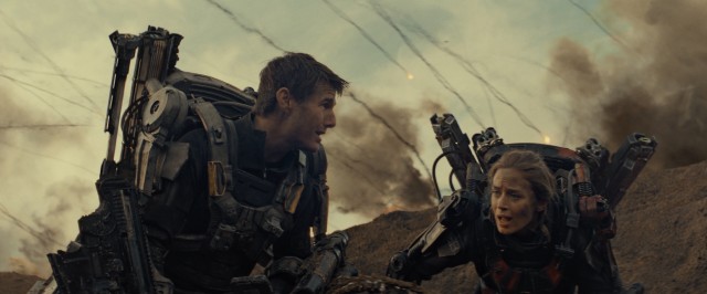 William Cage (Tom Cruise) and Rita Vrataski (Emily Blunt) pool their efforts to try to defeat an alien slaughter with day-resetting in "Edge of Tomorrow."
