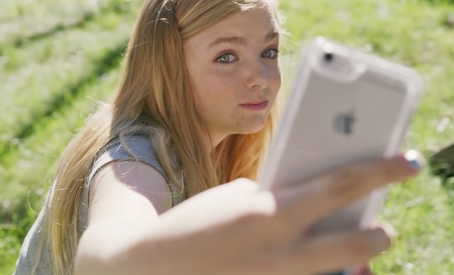 Kayla Day (Elsie Fisher) snaps a selfie from a flattering high angle in "Eighth Grade."