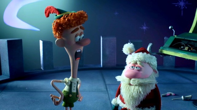 Buddy the Elf is surprised to learn of his real origins from Santa Claus in "Elf: Buddy's Musical Christmas."