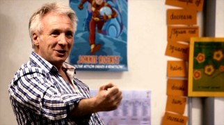 John Chapman, who used to take credit for playing a Star Wars pilot, no longer does, now instead sharing his Jonnie Rocket comic books with school children.