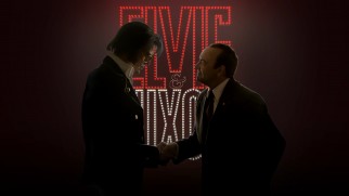Elvis & Nixon shake hands on the "Elvis & Nixon." Blu-ray menu.