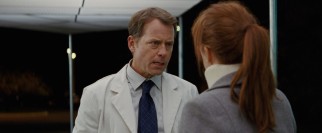 Dr. Tom Sherwood (Greg Kinnear) explains to Linda he's not the monster his son's play would have her believe.