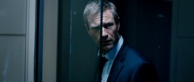 Two-Face returns as Ben Logan (Aaron Eckhart) finds his workplace altogether vanished, or "erased" if you prefer.