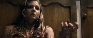The infected left hand of Natalie (Elizabeth Blackmore) seems to have a mind of its own.