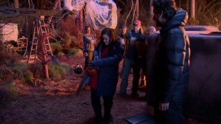 Uruguayan first-time feature filmmaker Fede Alvarez coaches Jane Levy through chainsaw operation in "Directing the Dead."
