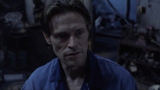 Willem Dafoe plays Gas, a country gas station clerk willing to install an unregistered bioport in Ted's spine.