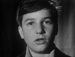 Jean-Pierre Laud is again interrogated by an offscreen figure, this time a year after filming for a Cannes 1959 newsreel.