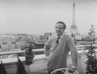 Oui, that is the Eiffel Tower standing behind Franois Truffaut in his "Cinastes de notre temps" interview. NBD.