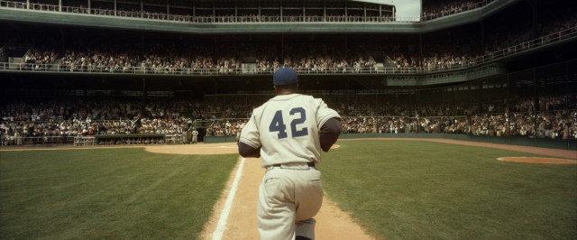 Jackie Robinson rounds third base and heads home in the 2013 biopic "42."
