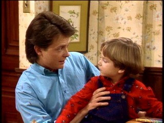 Alex (Michael J. Fox) shares his wisdom with his adoring younger brother Andy (Brian Bonsall).