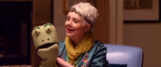 GG (Shirley Jones) brings out hand puppets for another unfunny sequence.