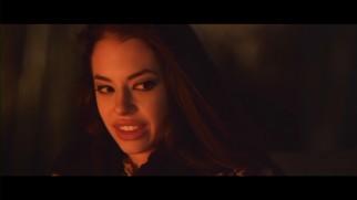 The plump-lipped Kat (Chloe Bridges) talks walrus homosexuality in this deleted fireside scene.