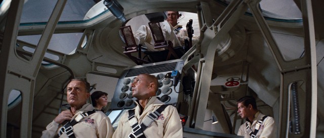 The five-member crew of the submarine Proteus prepares to make a fantastic voyage.
