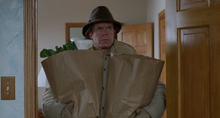 With grocery bags in hand, Minneapolis car dealer Jerry Lundegaard (William H. Macy) comes home to find the scene of a crime he arranged in "Fargo."