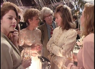 Director Charles Shyer gives Diane Keaton some guidance during a wedding reception scene in "An Invitation to 'Father of the Bride.'"