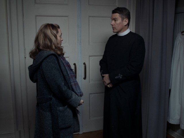 Pregnant parishioner Mary Mensana (Amanda Seyfried) brings her concerns to Reverned  Toller (Ethan Hawke), who initially tries to refer her elsewhere.