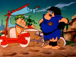 Fred Flintstone's propensity for speeding repeatedly gets him into trouble in "Flintstones Little Big League."