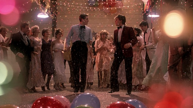 Everybody cut footloose in the grain mill prom finale of colorful string lights, balloons, and confetti!