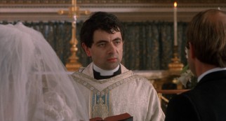 Richard Curtis collaborator Rowan Atkinson appears as nervous, novice Father Gerald, who sweats and stumbles his way through the second wedding's vows.