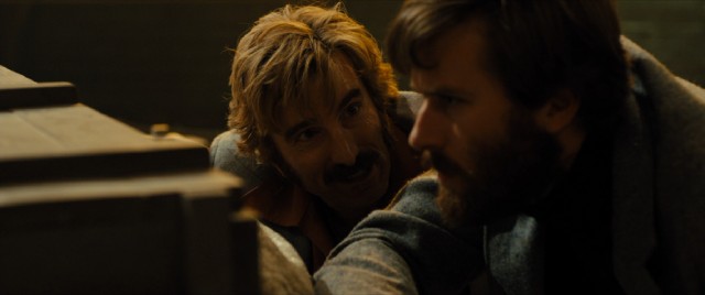 Sharlto Copley and Armie Hammer are among the hirsute men distrusting one another and hoping to stay alive in "Free Fire."