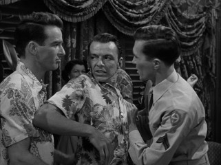The hot-tempered private Angelo Maggio (an Oscar-winning Frank Sinatra) has to be held back from fighting a stockade sergeant.