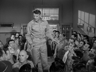 Though he repeatedly claims he doesn't want to become a commanding officer, Sgt. Milton Warden (Burt Lancaster) assumes an authority position during the climactic attack on Pearl Harbor.