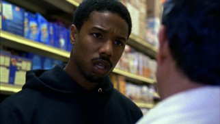 Oscar Grant (Michael B. Jordan) pleads for another chance at the supermarket from which he was recently fired.
