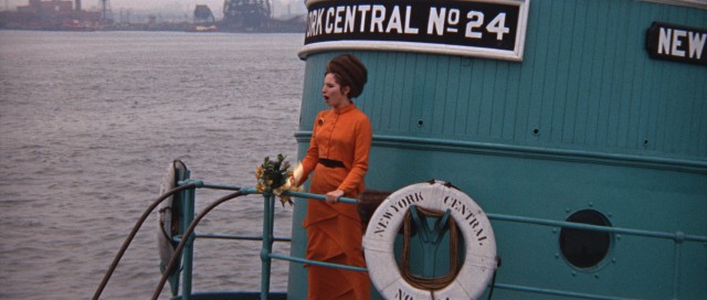 From a boat near Ellis Island, Fanny Brice (Barbra Streisand) performs "Don't Rain on My Parade."